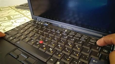 how do you brighten the screen on a lenovo laptop