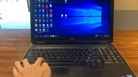 how to turn screen on dell laptop